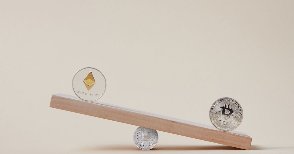 Minimalist image of Ethereum and Bitcoin coins balancing on a plank, symbolizing crypto market dynamics.